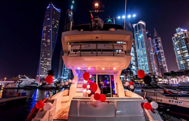Birthday Yacht Decorated with red & white balloons